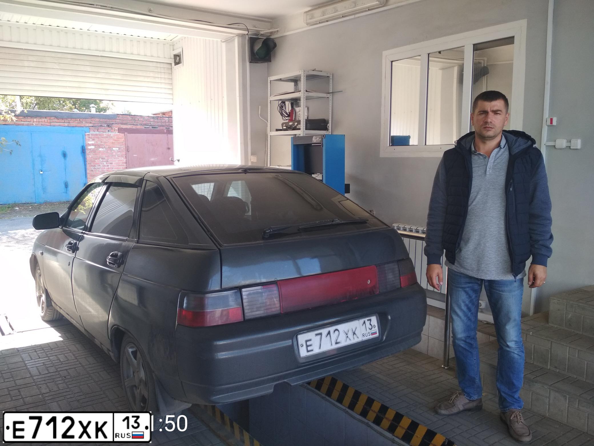 Фото автомобиля LADA 2112, 2007 — госномер Е712ХК13. Цвет: ЗОЛОТИСТЫЙ ТЕМНО-ЗЕЛЕНЫЙ