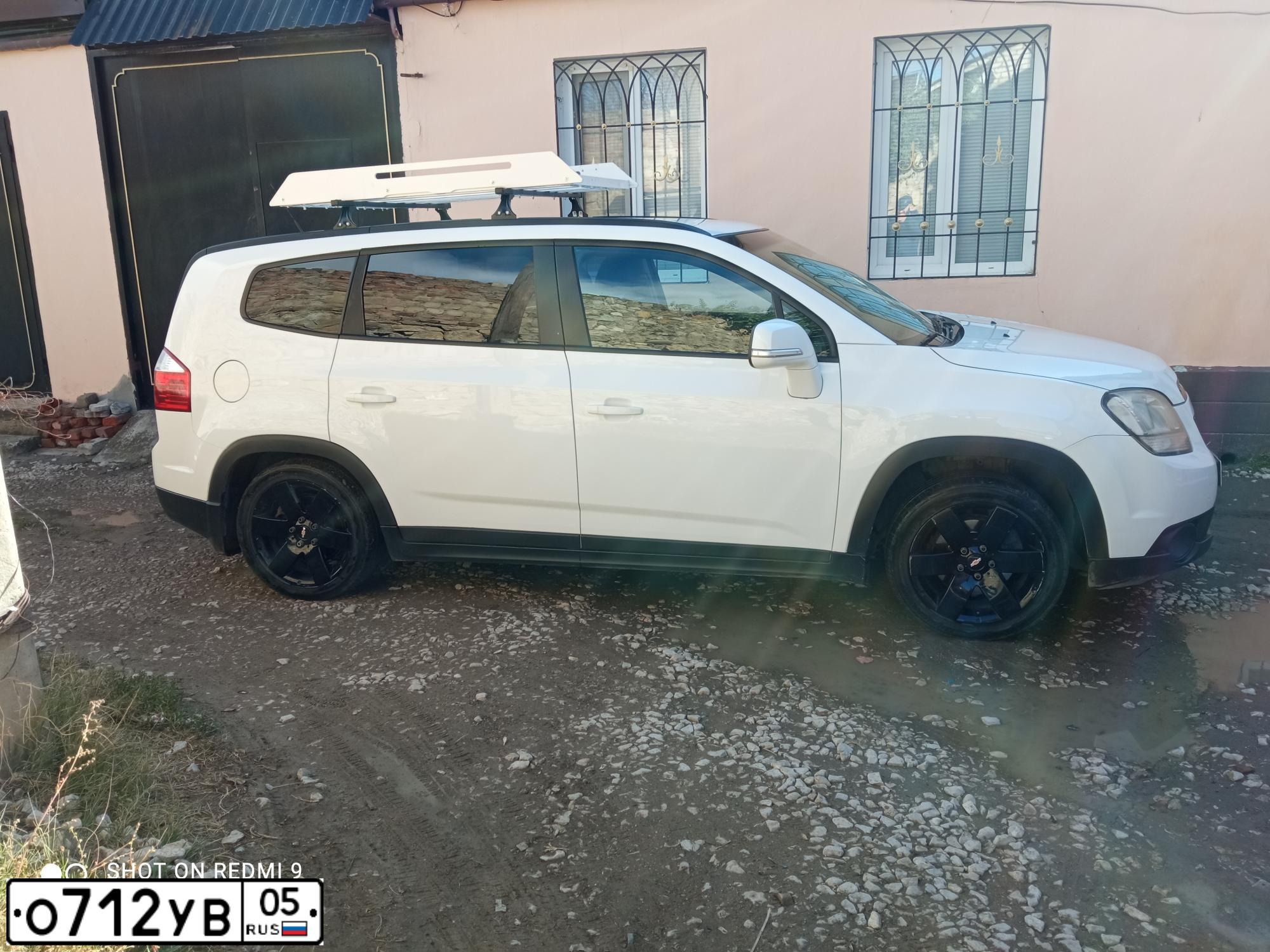 Фото автомобиля CHEVROLET ORLANDO, 2014 — госномер О712УВ05. Цвет: Белый
