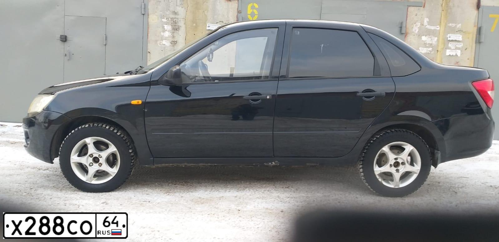 Фото автомобиля LADA 2190 GRANTA, 2012 — госномер Х288СО64. Цвет: Сине-Черный