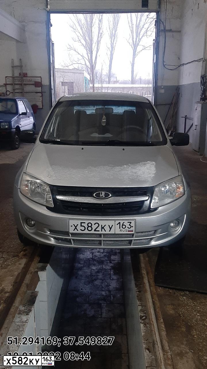 Фото автомобиля LADA 2190 GRANTA, 2012 — госномер Р600УВ163. Цвет: СЕРЕБРИСТЫЙ