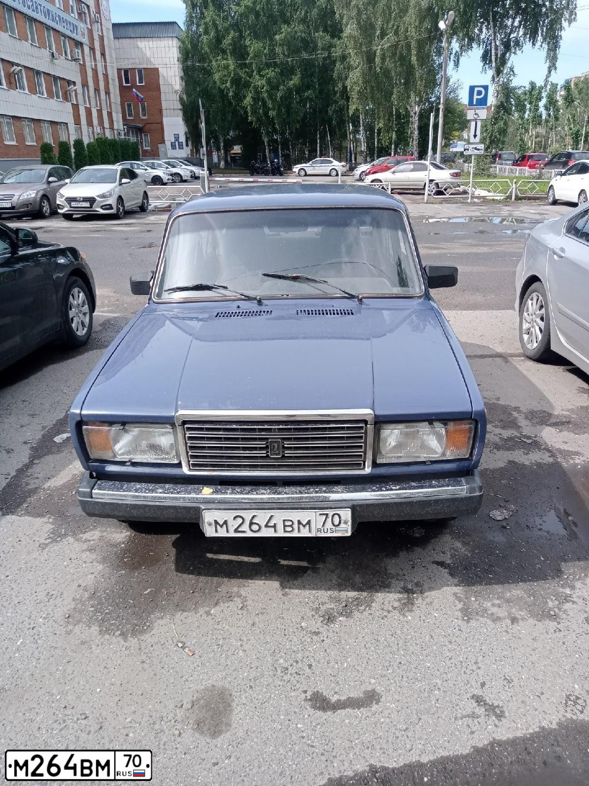 Фото автомобиля ВАЗ 21074, 2003 — госномер Н581ХМ70. Цвет: СИНИЙ