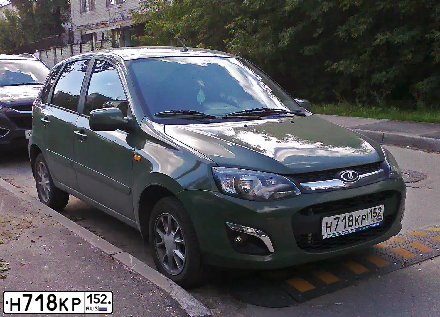 Фото автомобиля LADA 2192 KALINA, 2013 — госномер Н718КР152. Цвет: СВЕТЛО-ЗЕЛЕНЫЙ