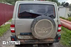 Фото автомобиля UAZ 3163 PATRIOT, 2010 — госномер Т536ЕВ190. Цвет: СЕРЕБ ЖЕЛТ МЕТАЛЛИК