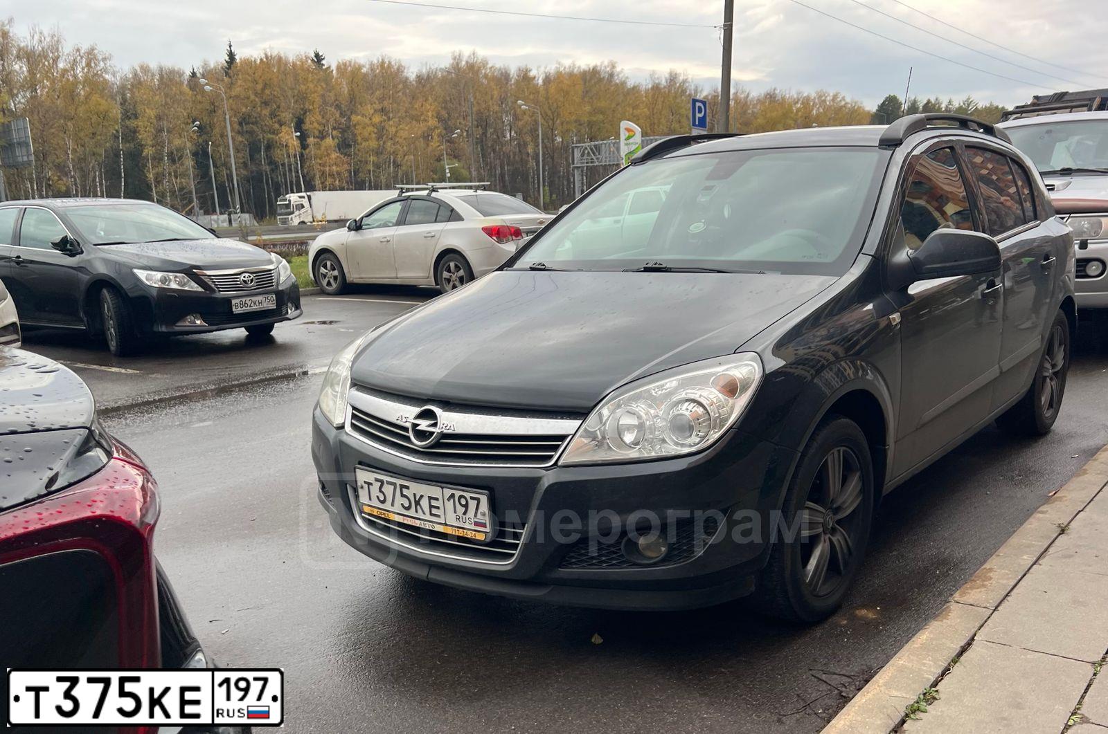 Фото автомобиля CHEVROLET AVEO, 2010 — госномер Е570ВО181. Цвет: Красный