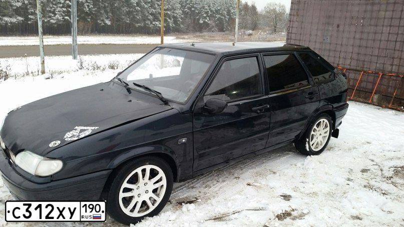 Фото автомобиля LADA 2114 SAMARA, 2009 — госномер С312ХУ190. Цвет: ЧЕРНЫЙ