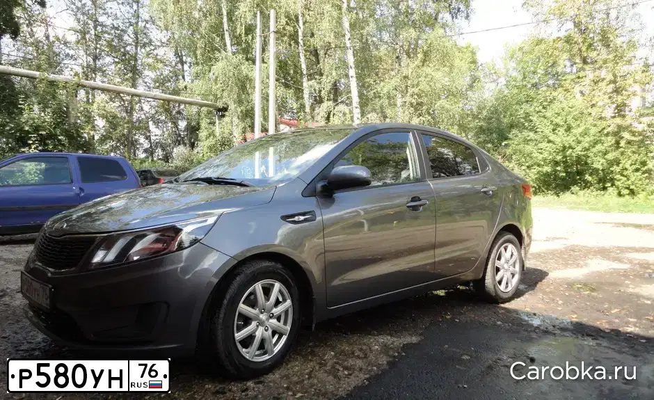 Фото автомобиля KIA RIO, 2014 — госномер О886УО44. Цвет: СЕРЫЙ