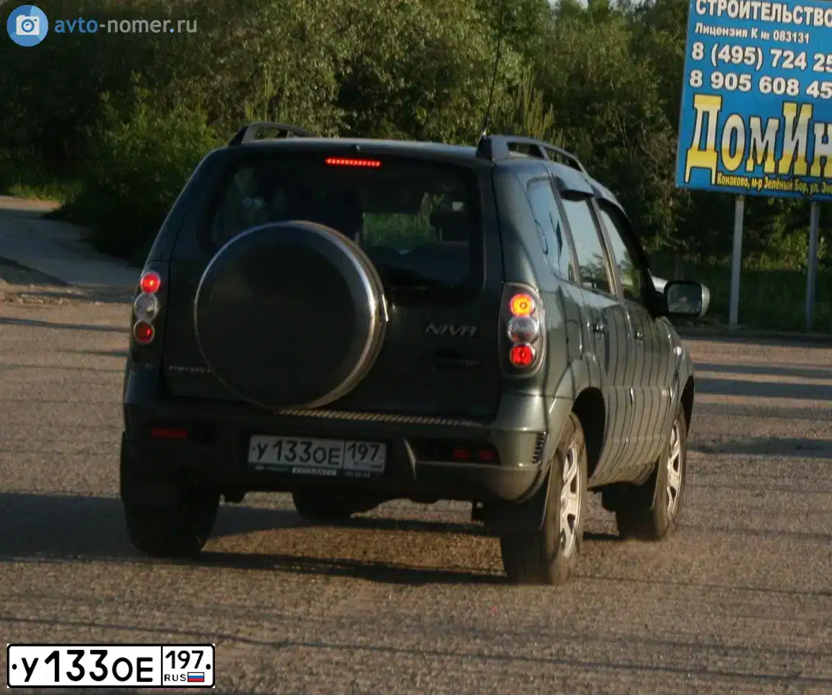 Фото автомобиля CHEVROLET NIVA 212300-55, 2011 — госномер Е658ОК51. Цвет: Темно серо зеленый металлик