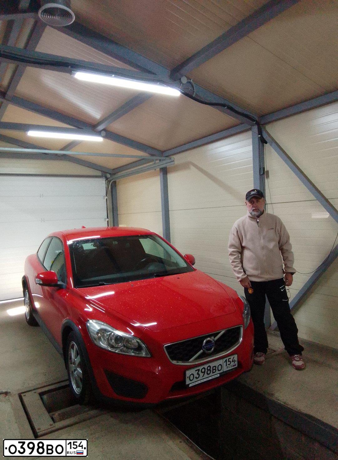 Фото автомобиля VOLVO C30, 2011 — госномер Т705СА790. Цвет: КРАСНЫЙ