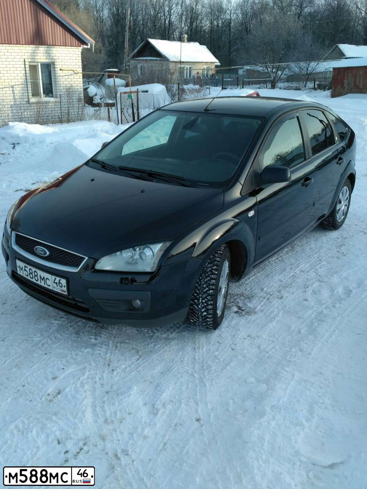 Фото автомобиля FORD FOCUS, 2005 — госномер Х548АС31. Цвет: ЧЕРНЫЙ