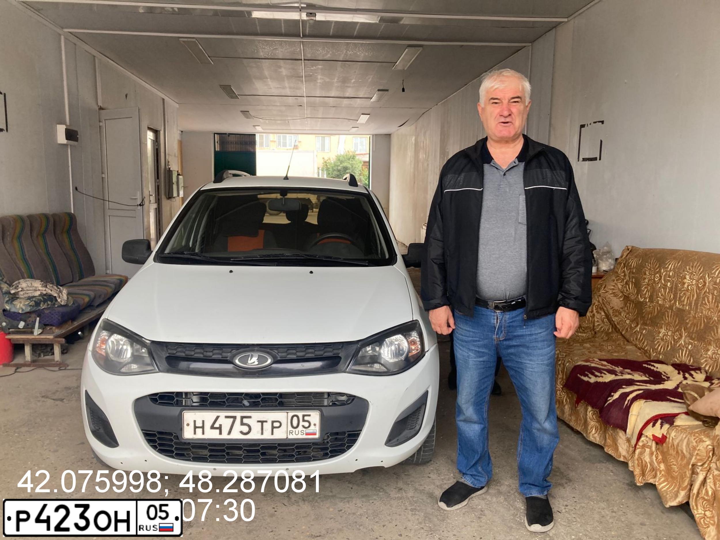 Фото автомобиля LADA 2114 SAMARA, 2013 — госномер Р423ОН05. Цвет: Сине-Черный