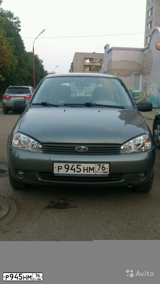 Фото автомобиля LADA 1117 KALINA, 2010 — госномер Р945НМ76. Цвет: ТЕМНО-СЕРЫЙ