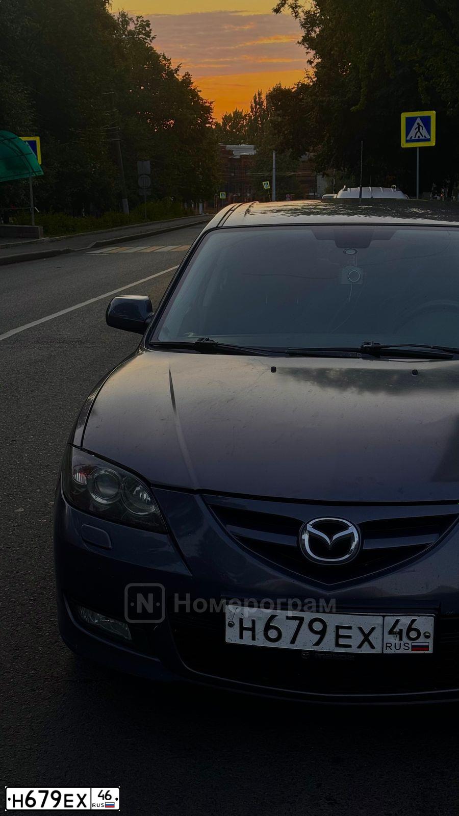 Фото автомобиля MAZDA 3, 2008 — госномер Н679ЕХ46. Цвет: Серый