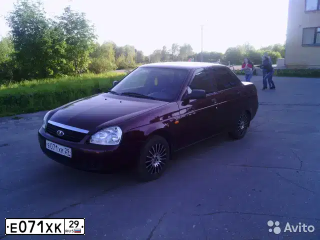 Фото автомобиля LADA PRIORA, 2010 — госномер О855РВ29. Цвет: ТЕМНО-ВИШНЕВЫЙ