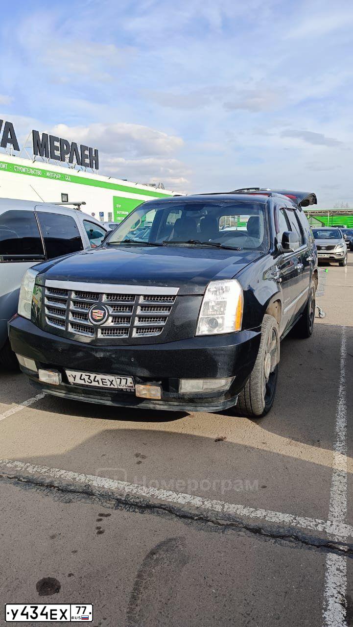 Фото автомобиля CADILLAC ESCALADE, 2012 — госномер У434ЕХ77. Цвет: ЧЕРНЫЙ МЕТАЛЛИК