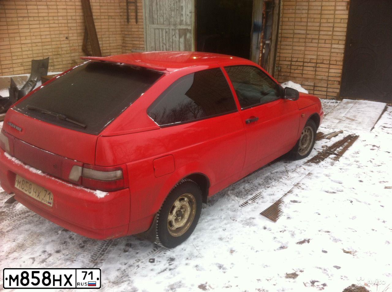 Фото автомобиля LADA 2112, 2007 — госномер Н273ОВ32. Цвет: ЯРКО-КРАСНЫЙ