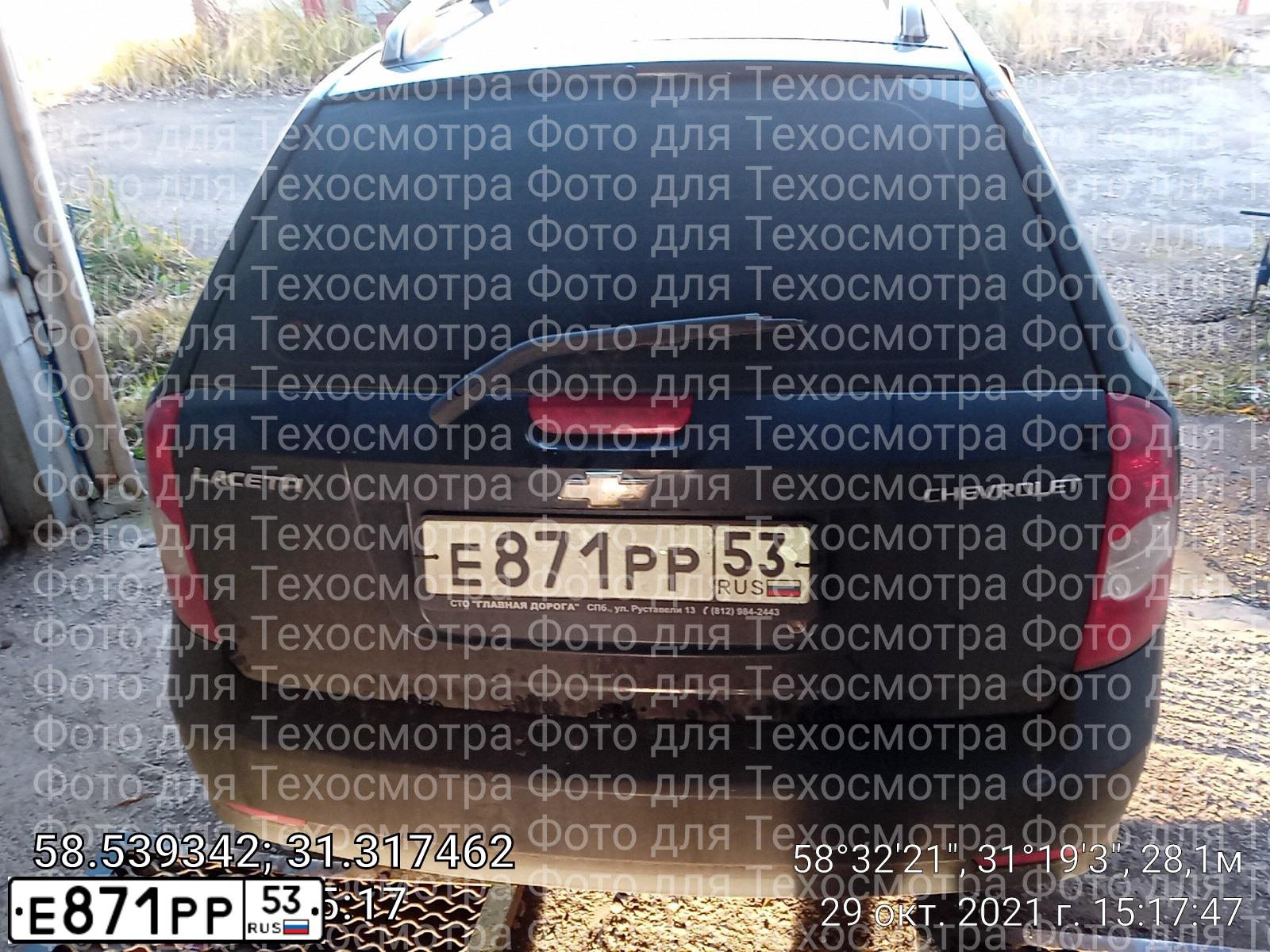 Фото автомобиля CHEVROLET LACETTI, 2010 — госномер Е871РР53. Цвет: ЧЕРНЫЙ