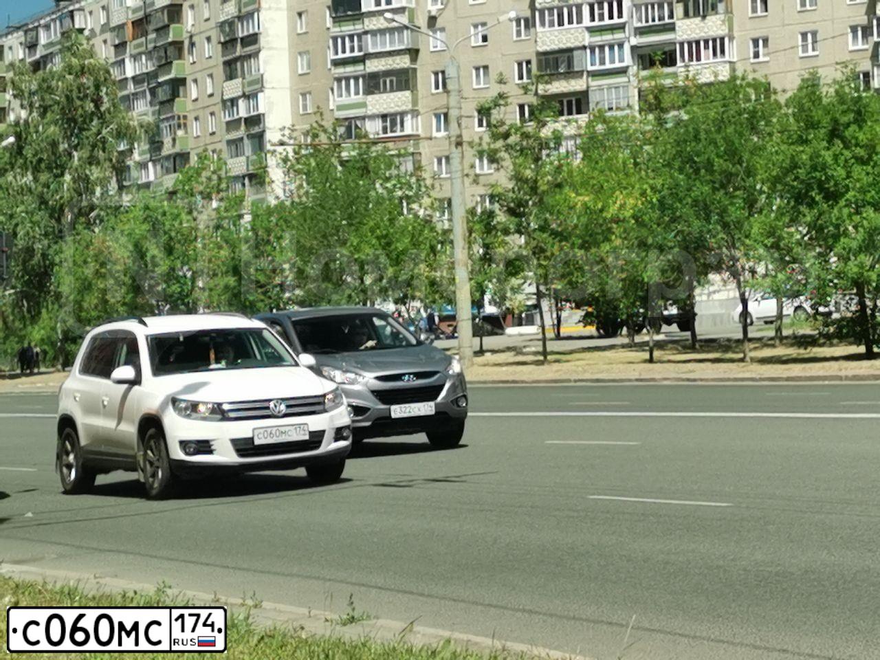 Фото автомобиля VOLKSWAGEN TIGUAN, 2012 — госномер Р337НЕ196. Цвет: Белый