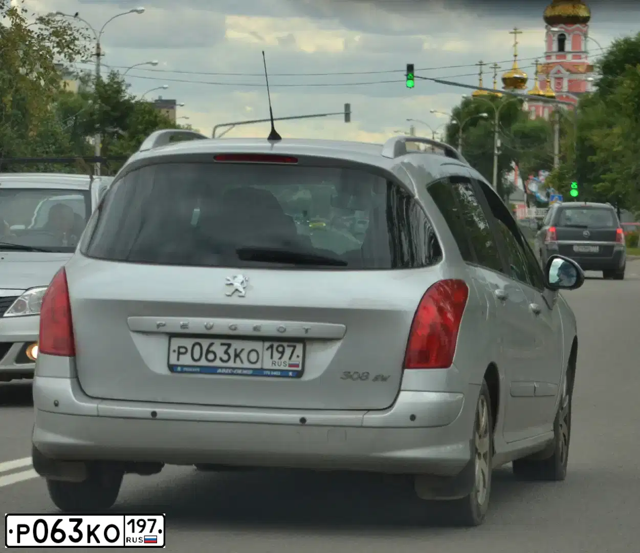 Фото автомобиля PEUGEOT 308, 2011 — госномер Р063КО197. Цвет: СЕРЫЙ