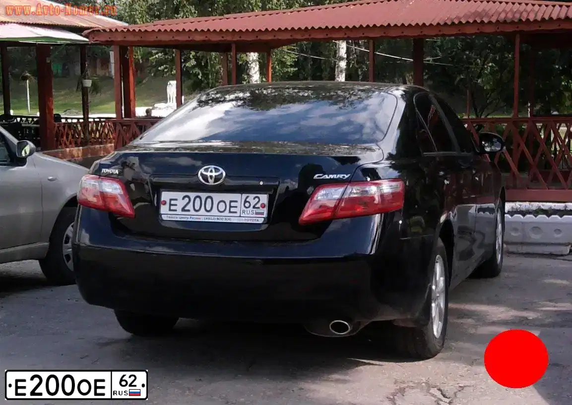 Фото автомобиля TOYOTA CAMRY, 2010 — госномер Е200ОЕ62. Цвет: ЧЕРНЫЙ