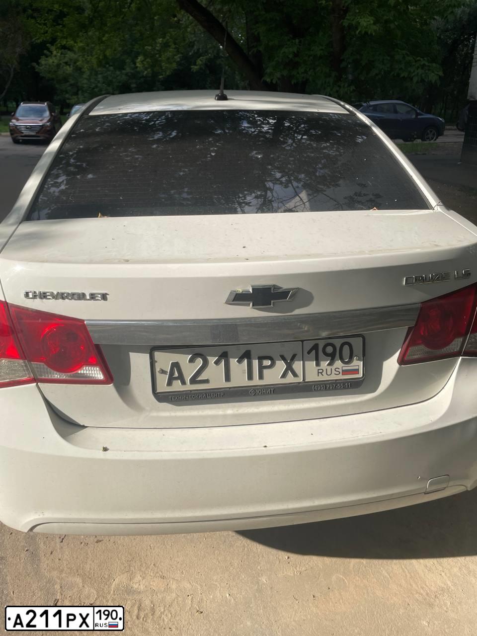 Фото автомобиля CHEVROLET CRUZE, 2011 — госномер А211РХ190. Цвет: Белый