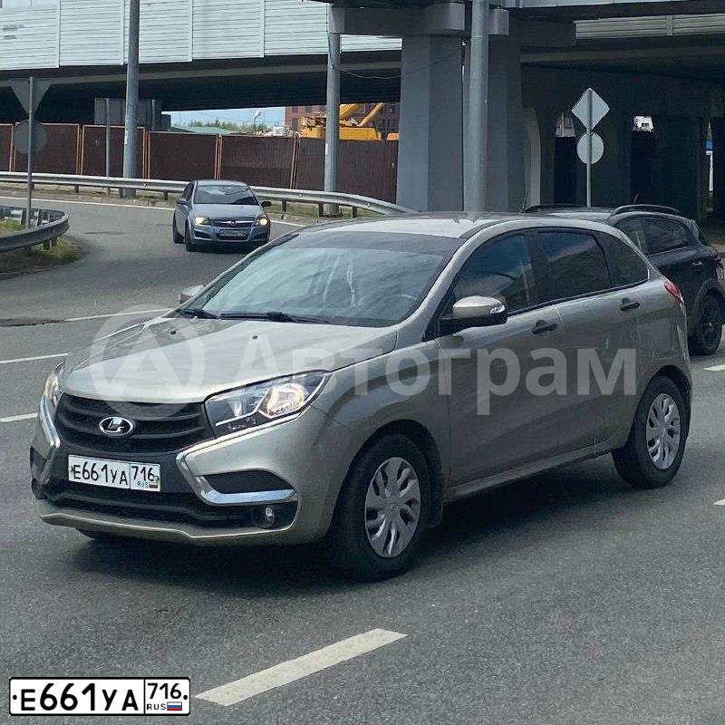 Фото автомобиля LADA XRAY, 2020 — госномер Е661УА716. Цвет: СЕРЫЙ