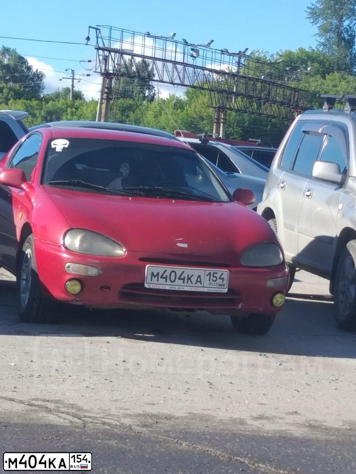 Фото автомобиля MAZDA MX-3, 1993 — госномер М404КА154. Цвет: Красный