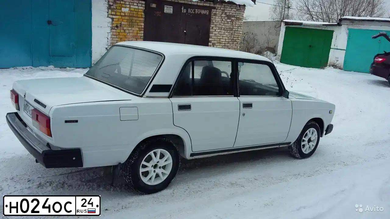 Фото автомобиля LADA 2107, 2004 — госномер Н024ОС24. Цвет: Белый