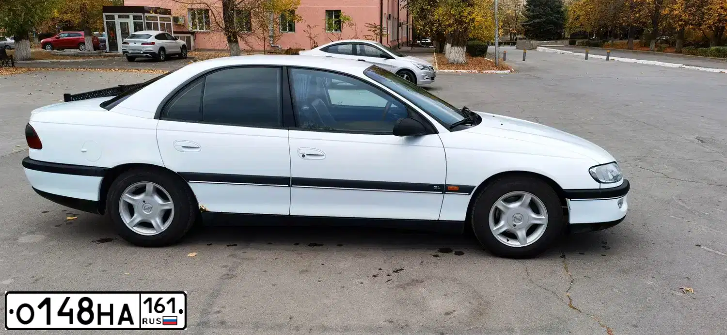 Фото автомобиля OPEL OMEGA, 1995 — госномер М857МА193