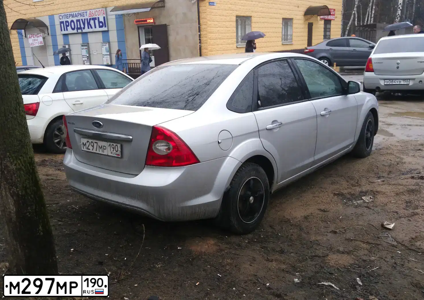 Фото автомобиля FORD FOCUS, 2009 — госномер М297МР190. Цвет: Серебристый