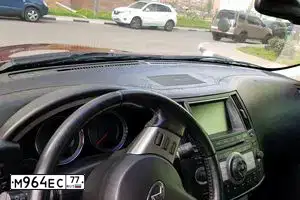 Фото автомобиля INFINITI QX70 /FX/, 2008 — госномер К384РН95. Цвет: Оранжевый
