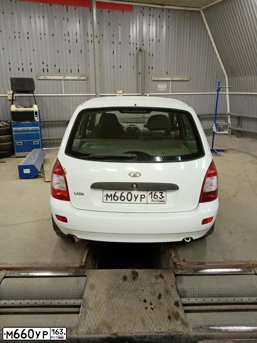 Фото автомобиля LADA 1117 KALINA, 2009 — госномер М660УР163. Цвет: БЕЛЫЙ