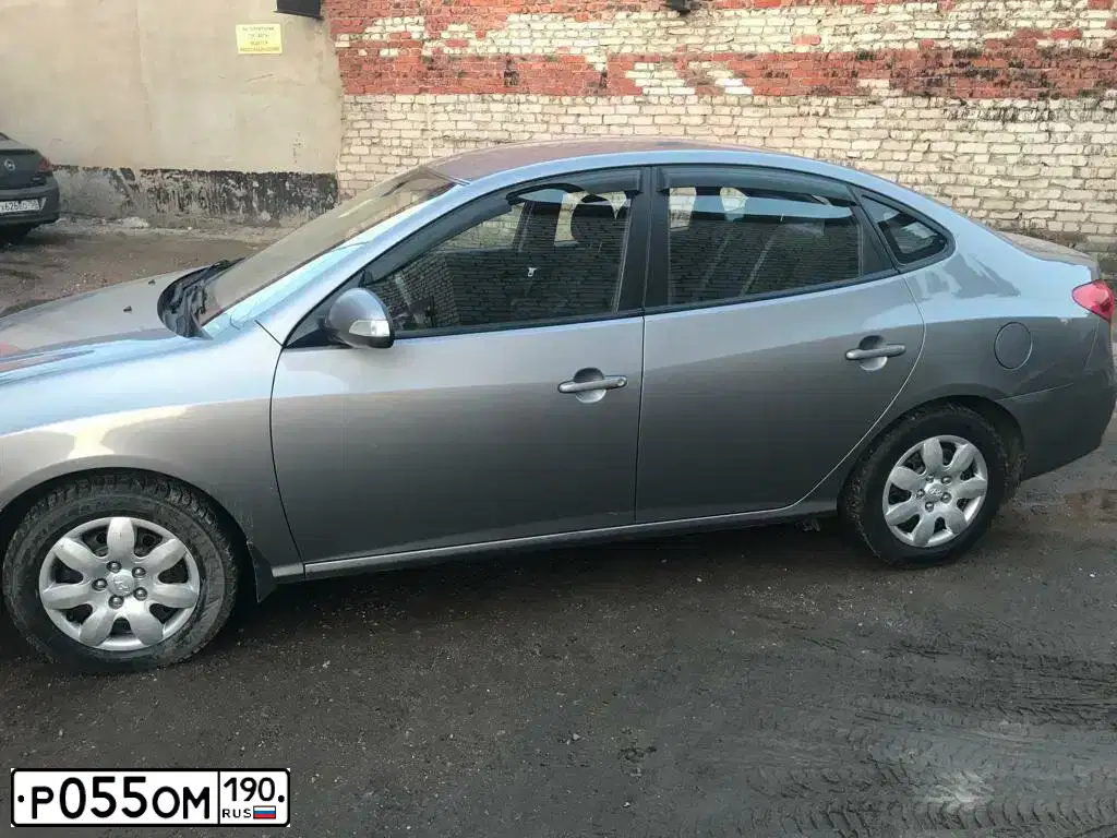 Фото автомобиля HYUNDAI I ELANTRA, 2011 — госномер Р055ОМ190. Цвет: СЕРЫЙ