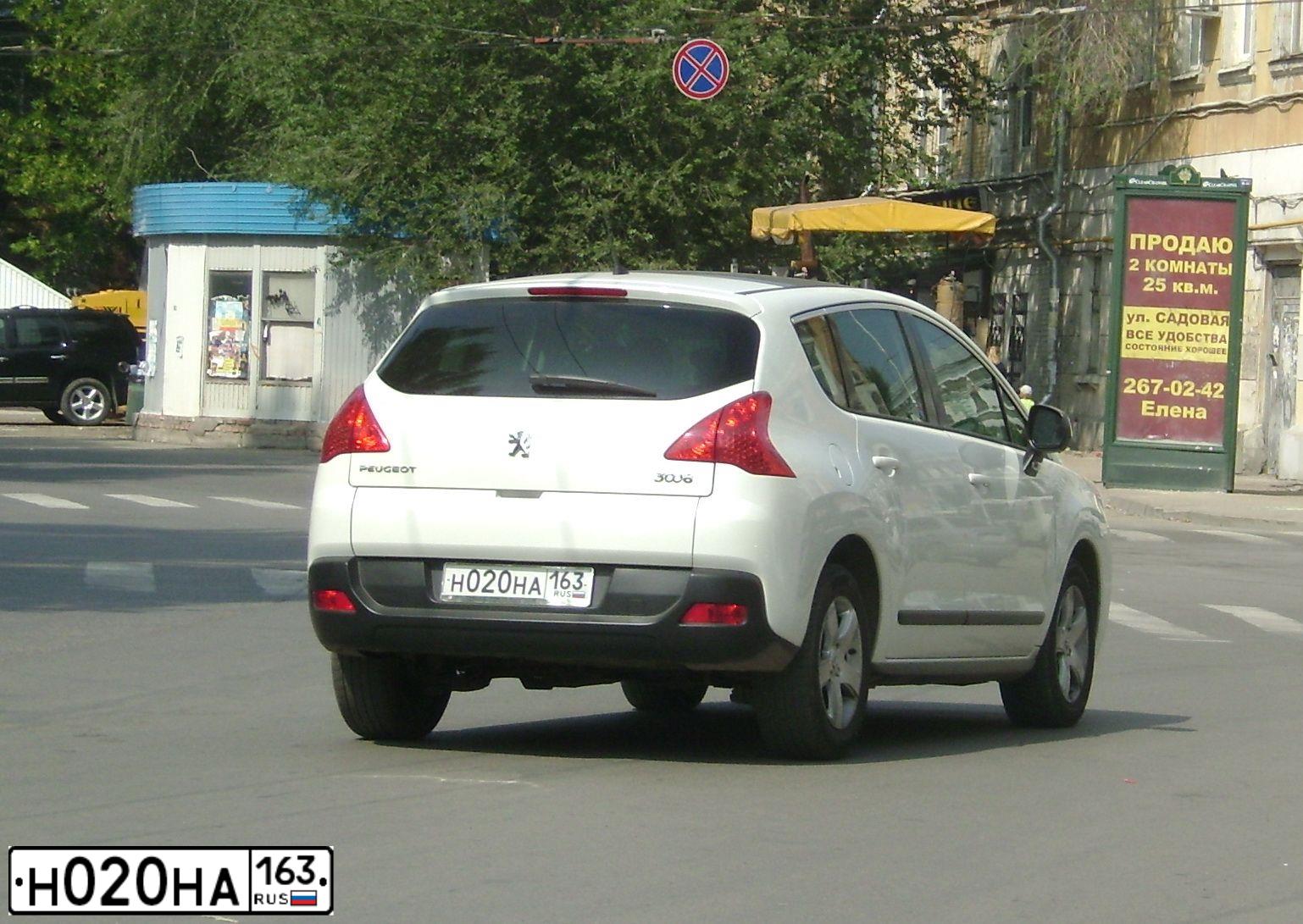 Фото автомобиля LADA 2112, 2003 — госномер Н020НА63. Цвет: СВЕТЛО-СЕРЕБРИСТЫЙ  МЕТАЛЛИК