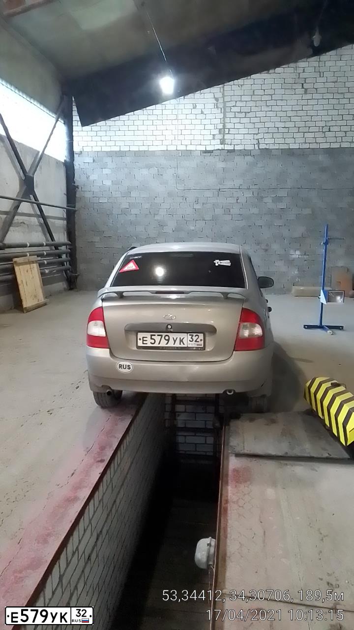 Фото автомобиля LADA 1118 KALINA, 2008 — госномер Е579УК32. Цвет: БЕЖЕВО-СЕРЫЙ
