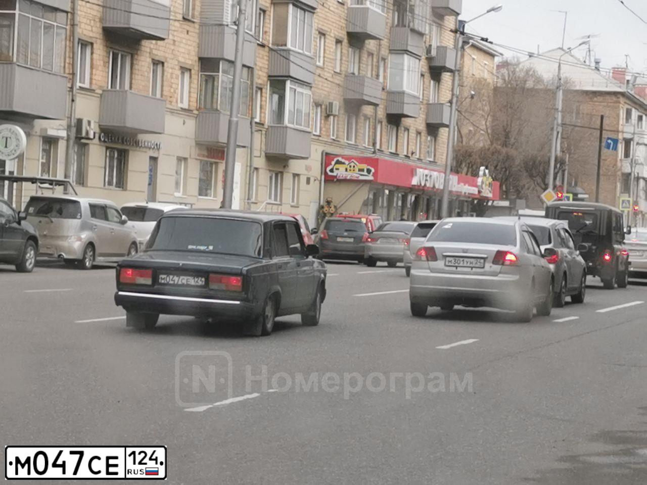 Фото автомобиля LADA 2107, 2010 — госномер М785ТТ124. Цвет: ЧЕРНЫЙ