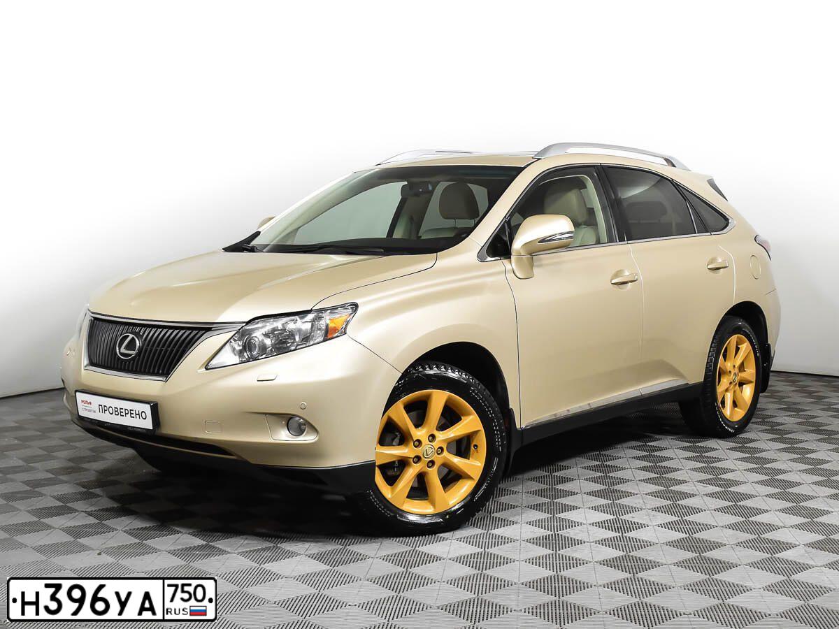 Фото автомобиля LEXUS RX, 2009 — госномер А702РР799. Цвет: БЕЖЕВЫЙ