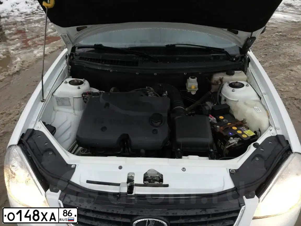 Фото автомобиля LADA 2172 PRIORA, 2011 — госномер О148ХА86. Цвет: Белый