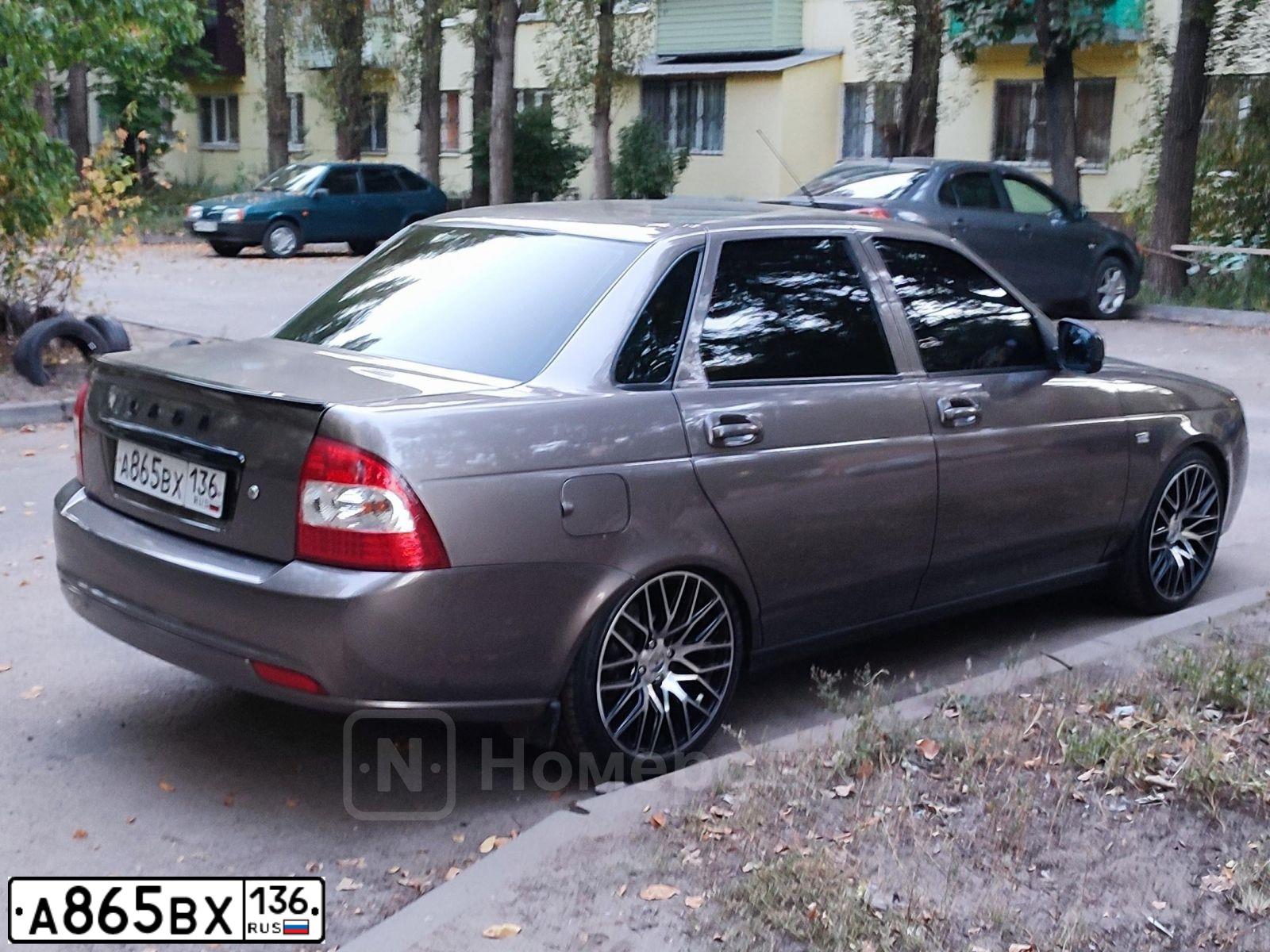 Фото автомобиля LADA 2170 PRIORA, 2017 — госномер А865ВХ136. Цвет: Золотисто-коричневый