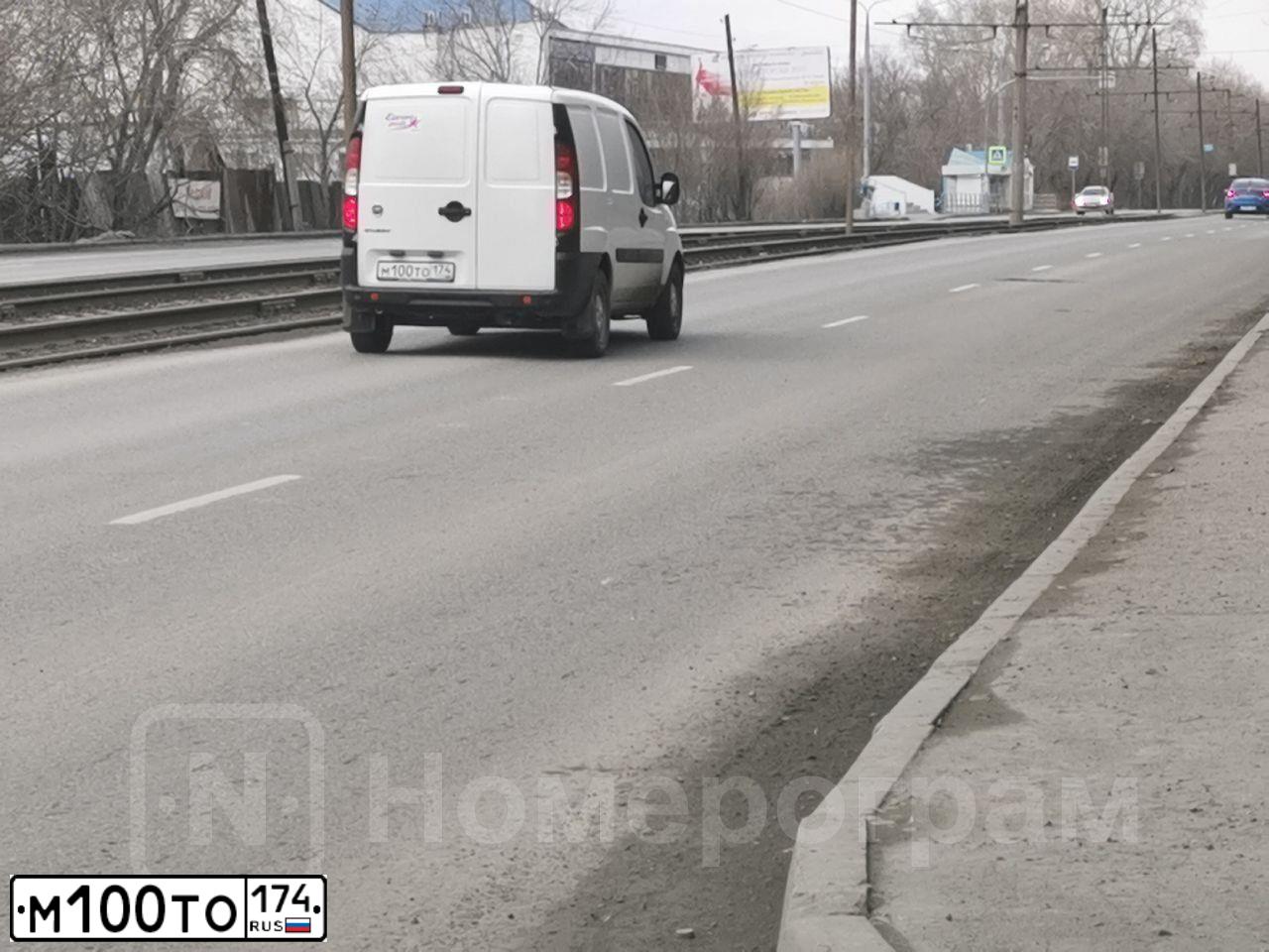 Фото автомобиля FIAT DOBLO, 2015 — госномер М100ТО174. Цвет: Белый