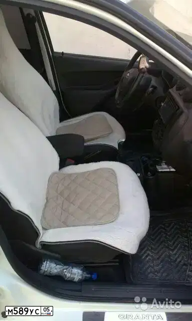 Фото автомобиля LADA 2190 GRANTA, 2013 — госномер М589УС05. Цвет: Белый