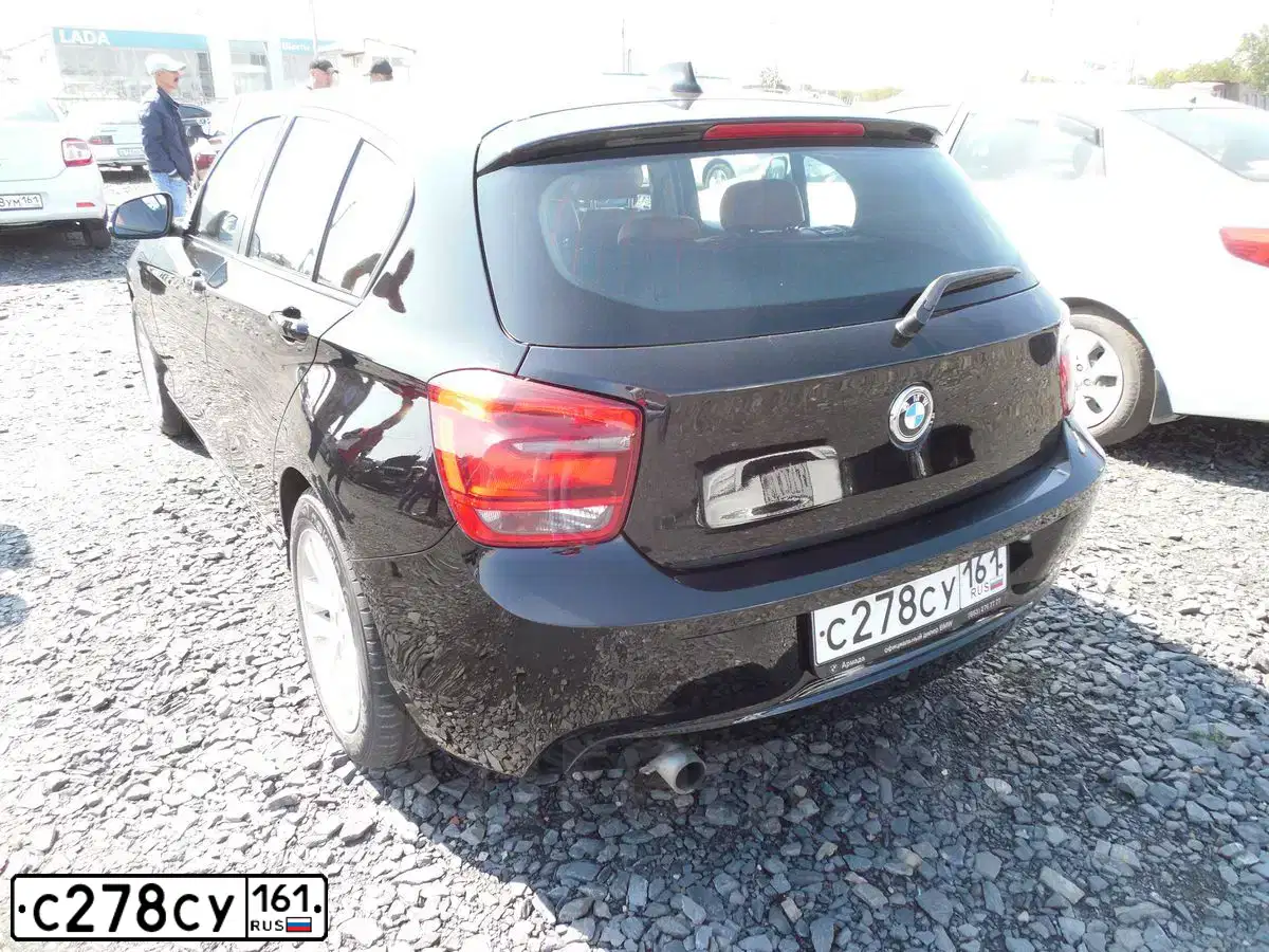Фото автомобиля BMW 116I, 2013 — госномер Т224ВТ761. Цвет: ЧЕРНЫЙ