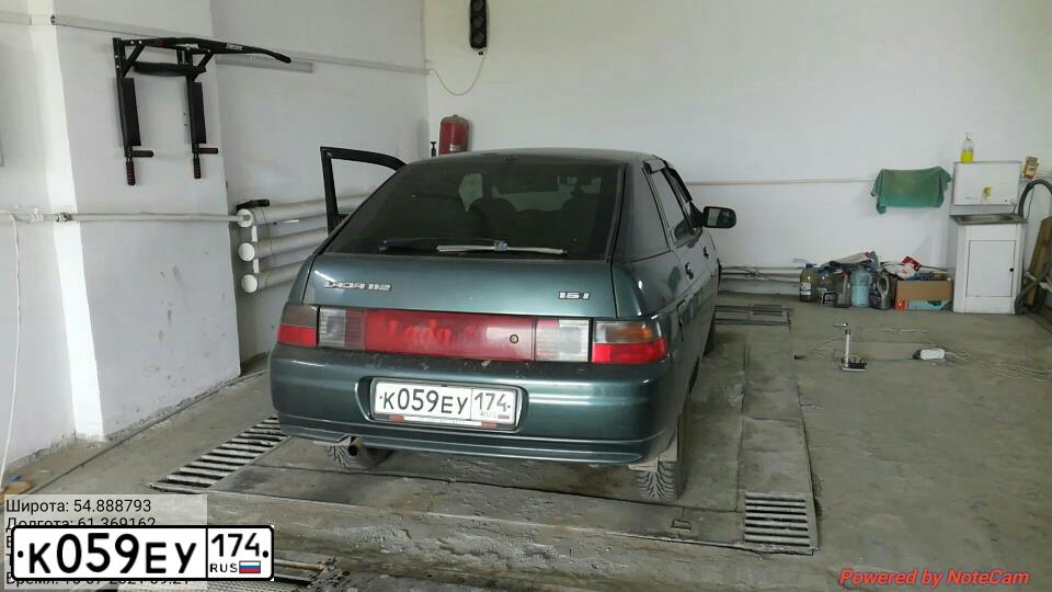 Фото автомобиля LADA 2112, 2006 — госномер Е976РС156. Цвет: СЕРО-СИНЕ-ЗЕЛЕНЫЙ