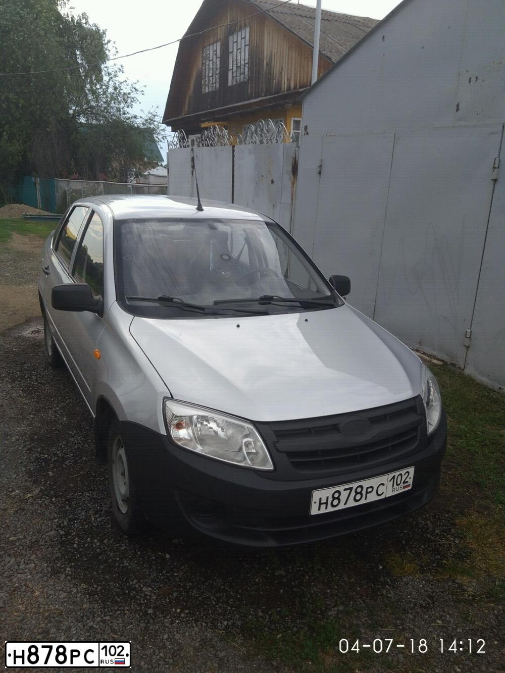 Фото автомобиля LADA 2190 GRANTA, 2012 — госномер Х624ВН102. Цвет: серебристый