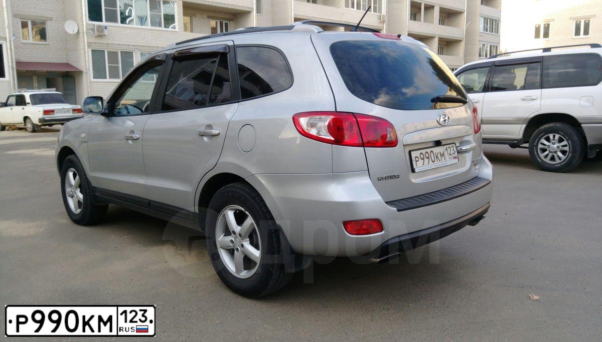 Фото автомобиля HYUNDAI SANTA FE, 2006 — госномер Е361ОН161. Цвет: серебристый
