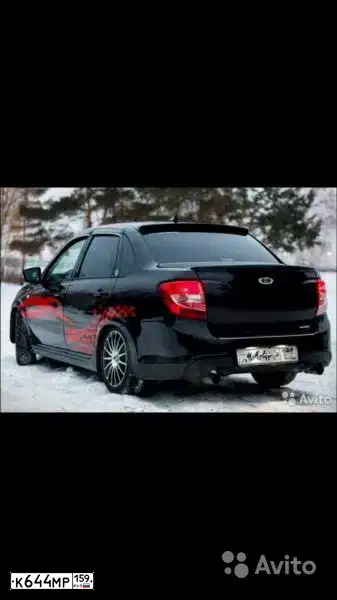 Фото автомобиля LADA 2190 GRANTA, 2014 — госномер Р213РУ05. Цвет: ЧЕРНЫЙ