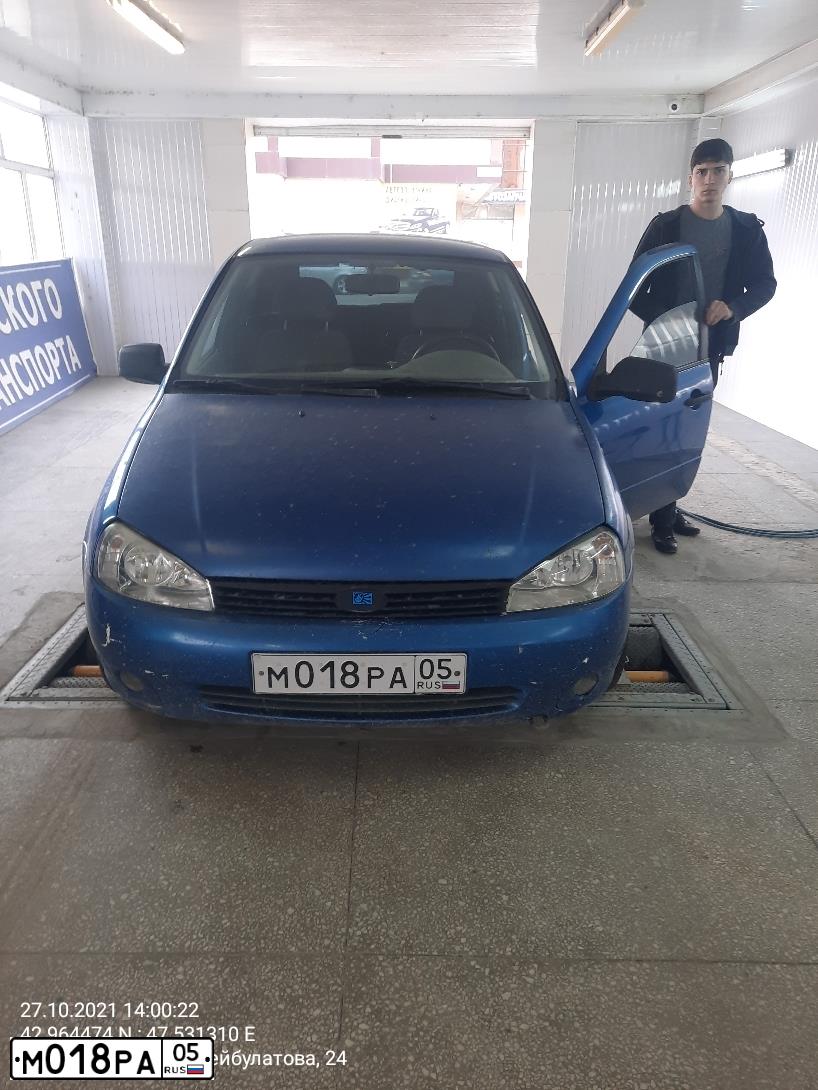 Фото автомобиля LADA 1119 KALINA, 2008 — госномер М018РА05. Цвет: ЯРКО-СИНИЙ
