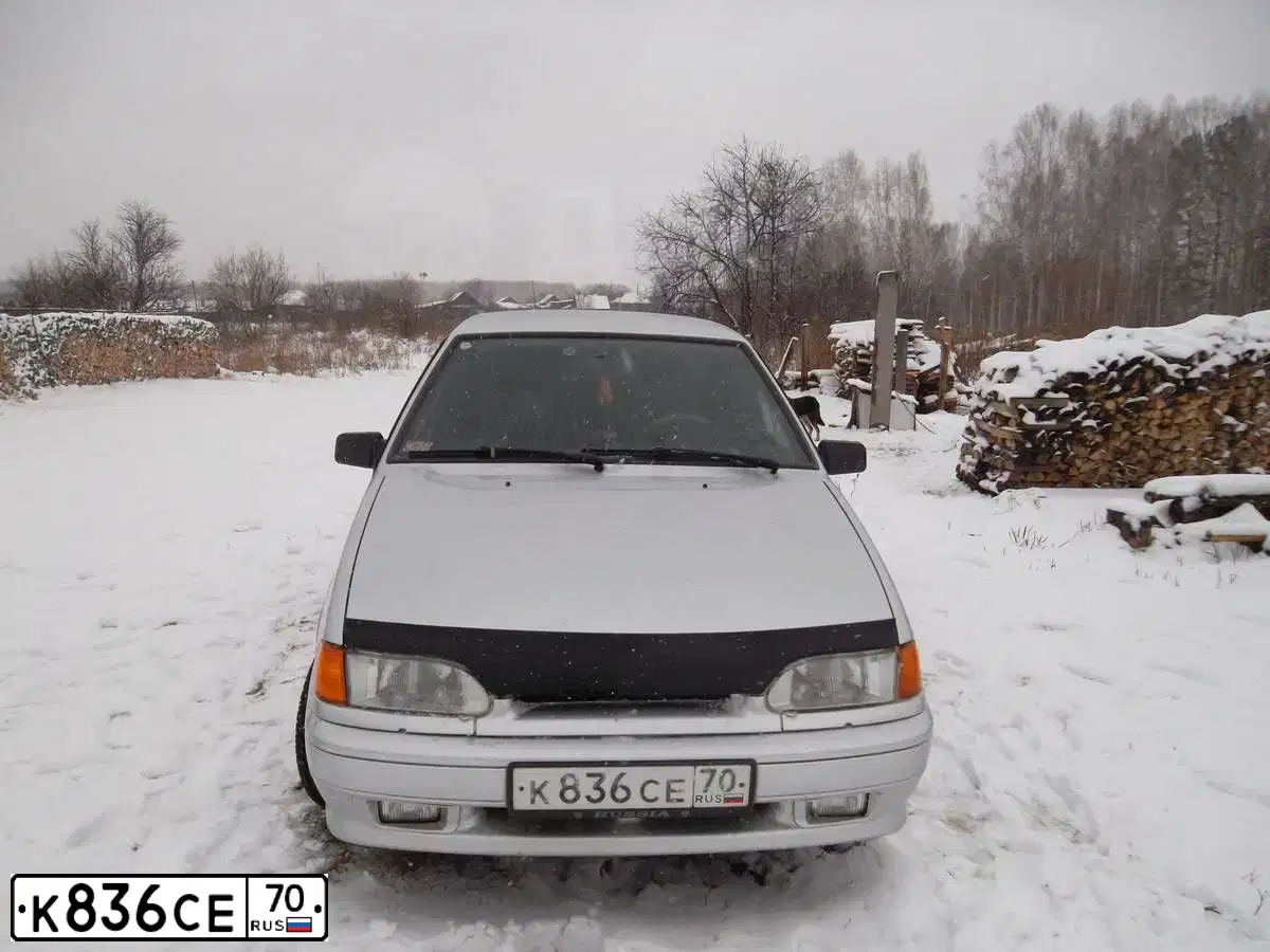 Фото автомобиля LADA 2115 SAMARA, 2010 — госномер К657ОЕ70. Цвет: СВЕТЛО-СЕРЕБРИСТЫЙ