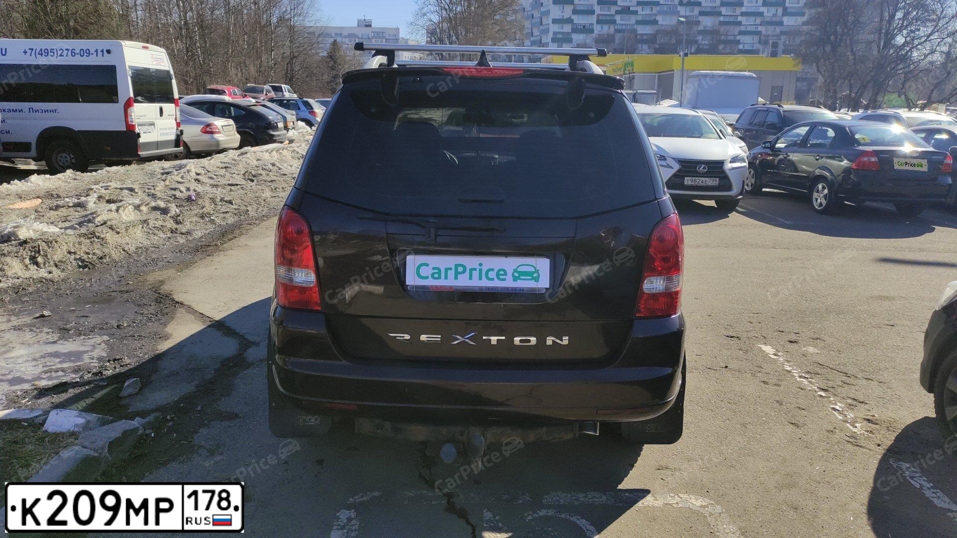 Фото автомобиля SSANGYONG REXTON, 2011 — госномер К209МР178. Цвет: БОРДОВЫЙ