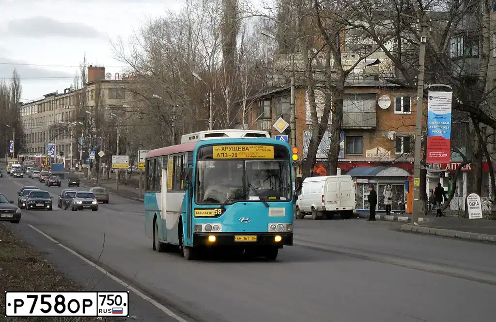 Фото автомобиля HYUNDAI AERO, 2001 — госномер Р758ОР750. Цвет: БЕЛЫЙ ЗЕЛЕНЫЙ