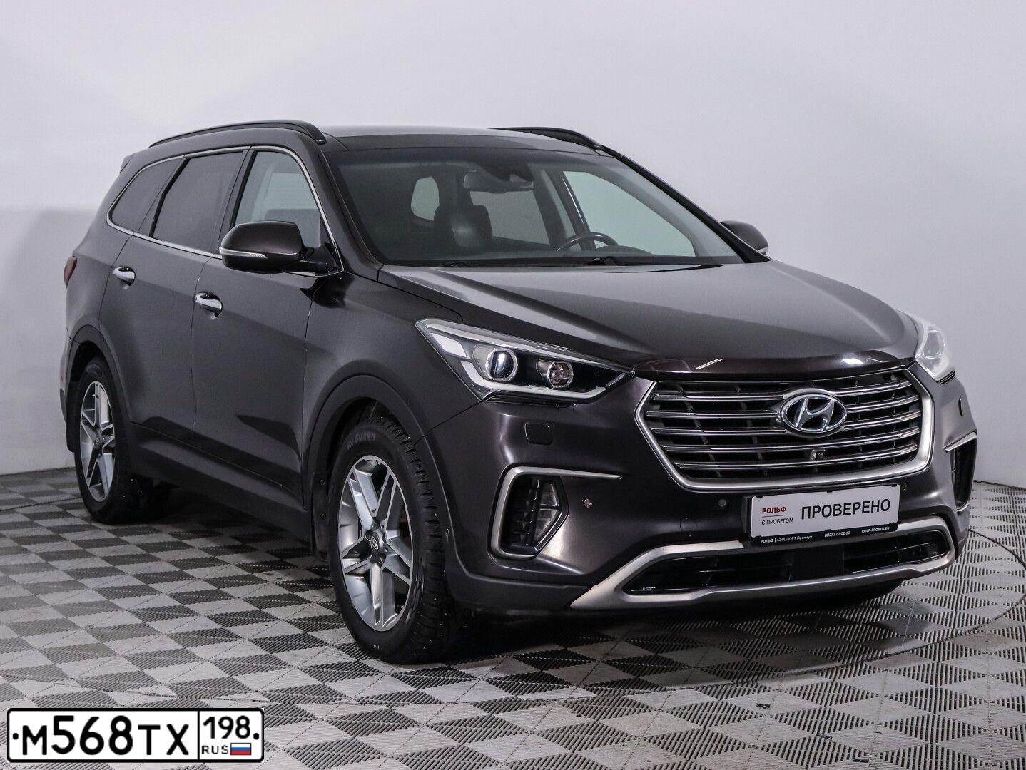 Фото автомобиля HYUNDAI GRAND SANTA FE, 2017 — госномер М568ТХ198. Цвет: Коричневый
